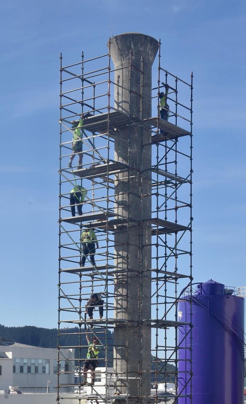 Industrial scaffold tower around a chimney